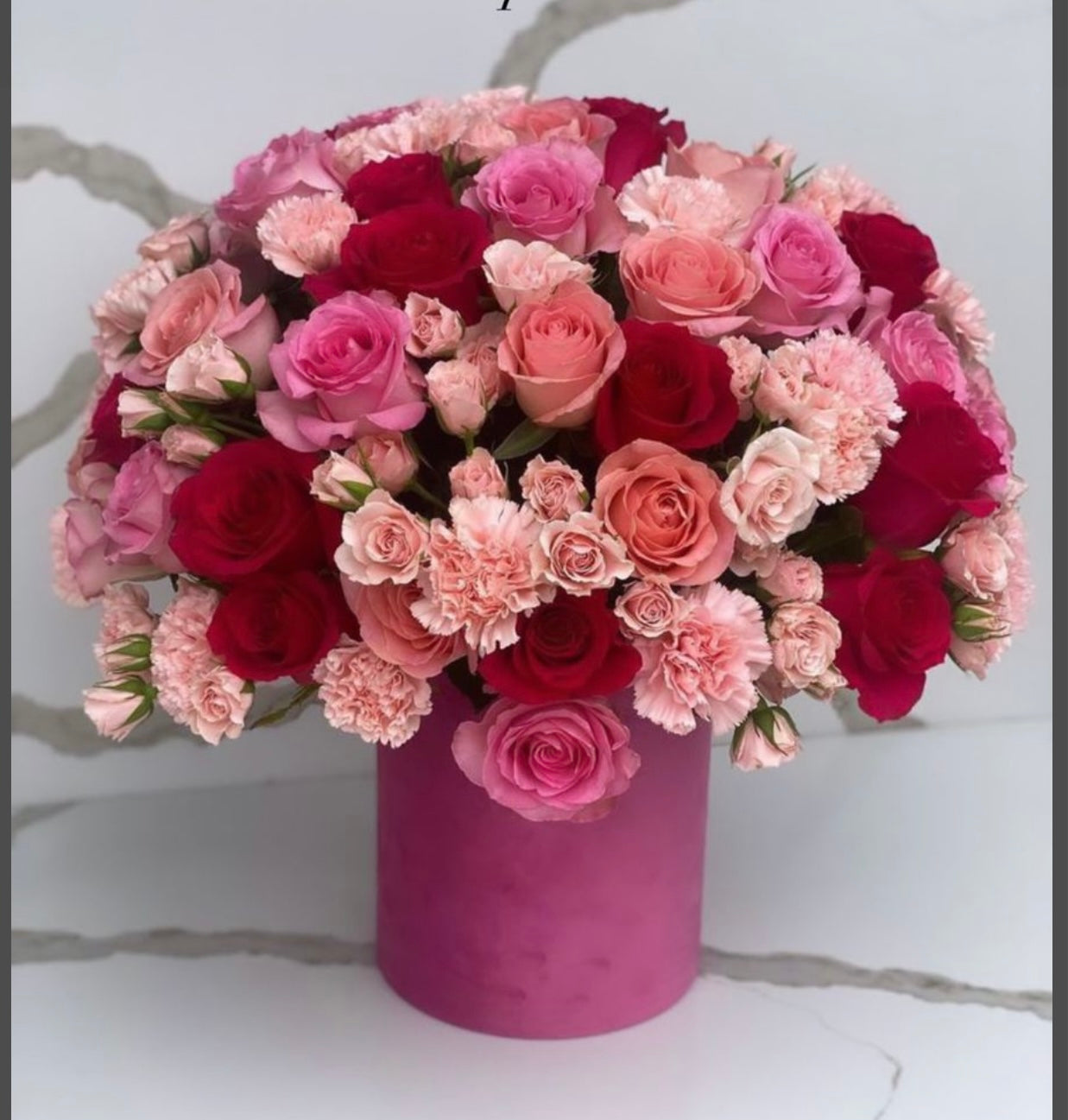 Ramo con rosas y claveles