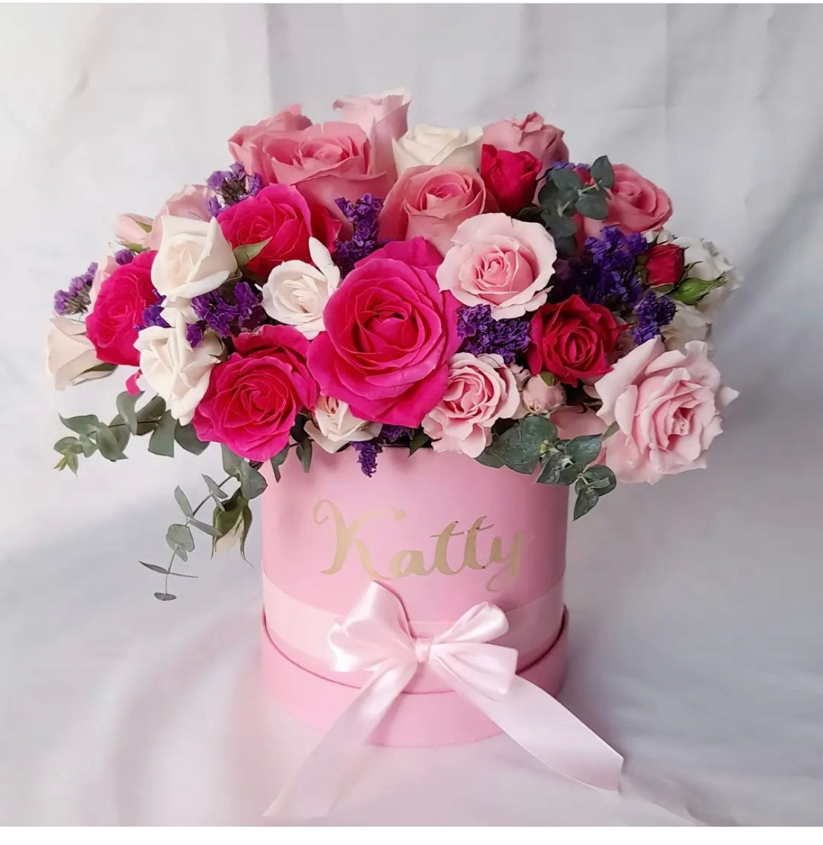 Ramo variedad de flores en tonos rosa y lila